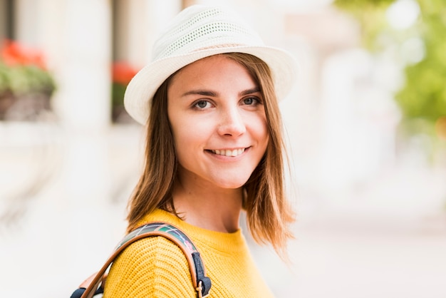 Portrait of smiley travelling woman