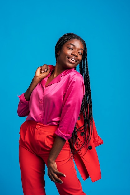 Portrait of smiley woman posing in the studio