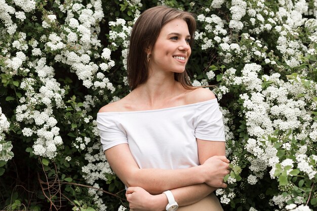 Portrait smiley woman with arms crossed