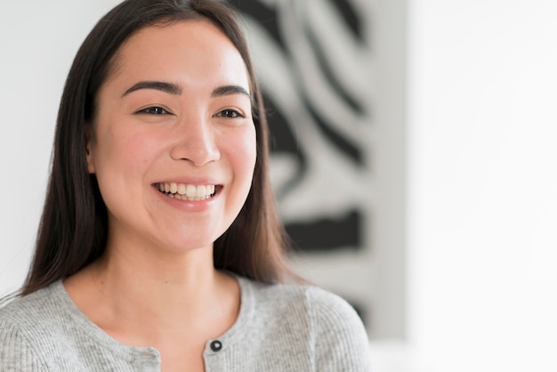 Free photo portrait smiley woman