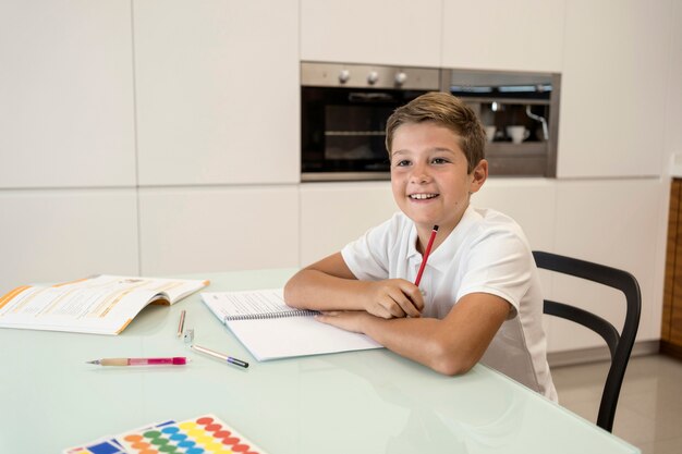 Portrait of smiley young boy posing