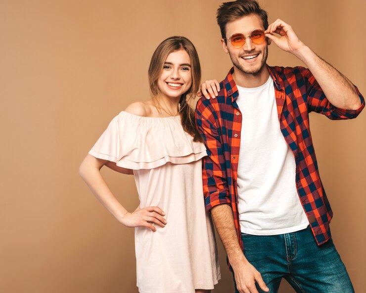 Free Photo portrait of smiling beautiful girl and her handsome boyfriend laughing.