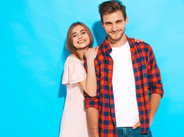 Portrait of Smiling Beautiful Girl and her Handsome Boyfriend laughing.