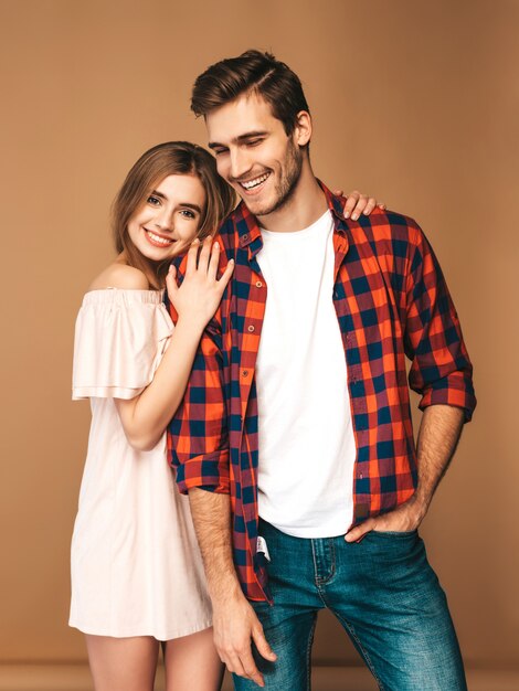 Portrait of Smiling Beautiful Girl and her Handsome Boyfriend laughing.