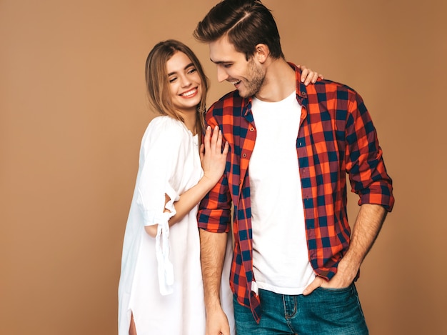 Portrait of Smiling Beautiful Girl and her Handsome Boyfriend laughing.