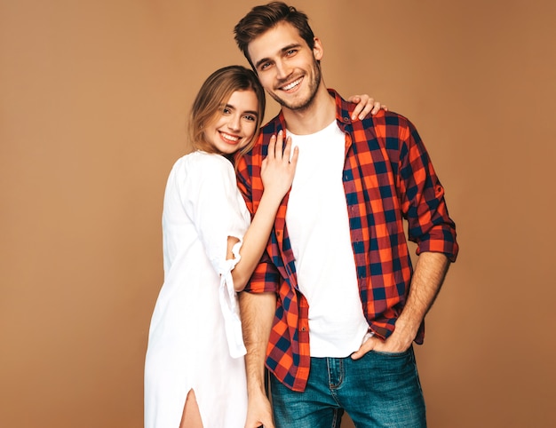 Portrait of Smiling Beautiful Girl and her Handsome Boyfriend laughing.