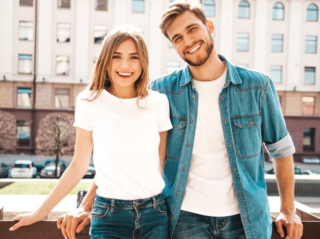 Portrait of smiling beautiful girl and her handsome boyfriend. woman in casual summer jeans clothes.
