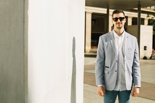 Portrait of smiling businessman outdoors