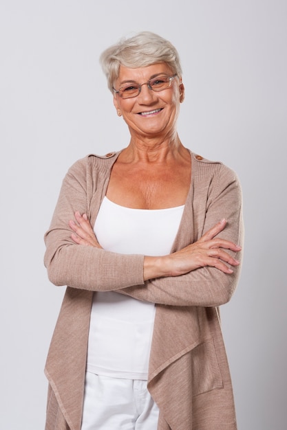 Portrait of smiling elegant senior woman