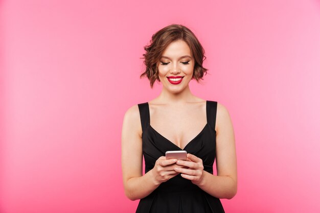 Portrait of a smiling girl dressed in black dress