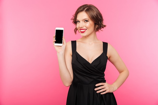 Portrait of a smiling girl dressed in black dress