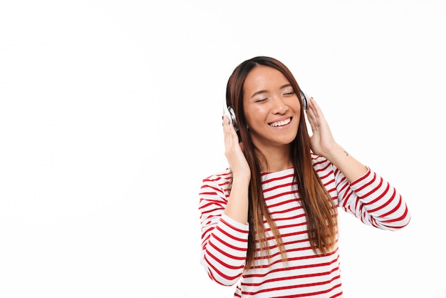 Portrait of a smiling joyful asian girl