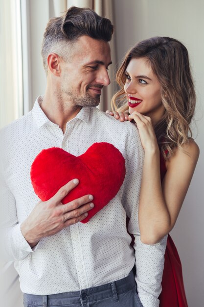 Portrait of a smiling loving smart dressed couple