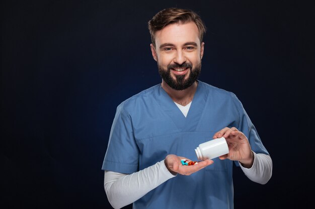 Portrait of a smiling male doctor dressed in uniform