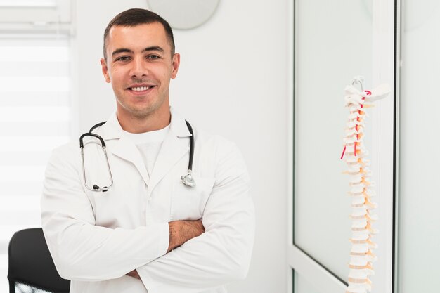 Portrait of smiling male doctor