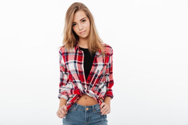 Portrait of a smiling pretty girl in plaid shirt