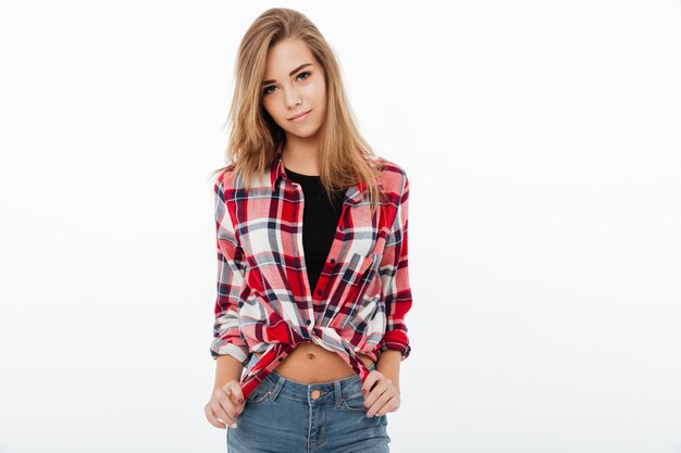 Portrait of a smiling pretty girl in plaid shirt