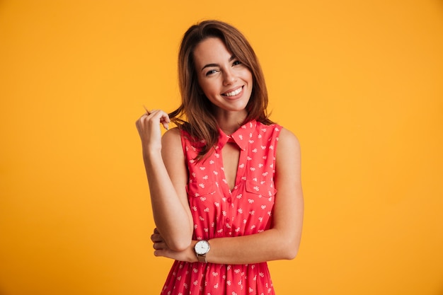Portrait of a smiling pretty woman wearing dress