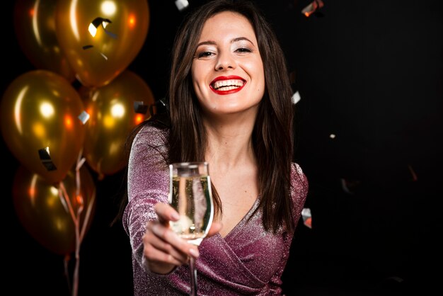 Portrait of smiling woman at new years party