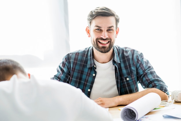 Portrait of a smiling young male architect