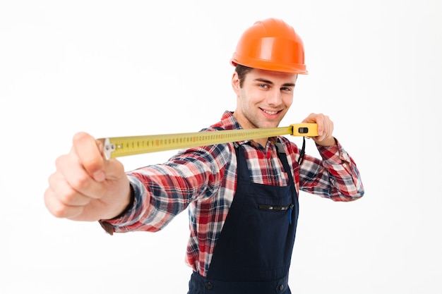 Portrait of a smiling young male builder