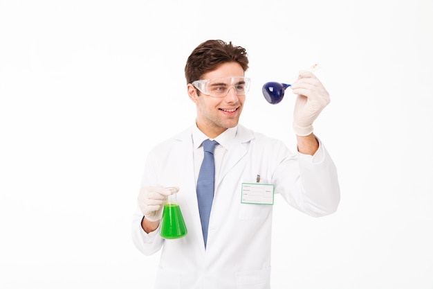 Free photo portrait of a smiling young male scientist