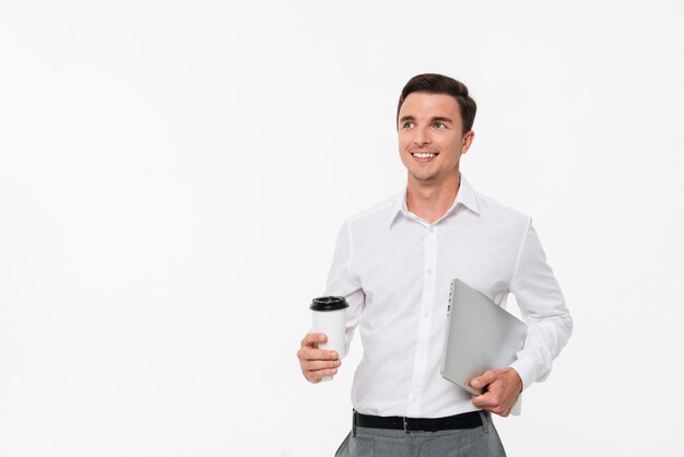 Portrait of a smiling young man in a white shirt