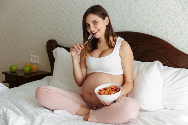 Portrait of a smiling young pregnant woman