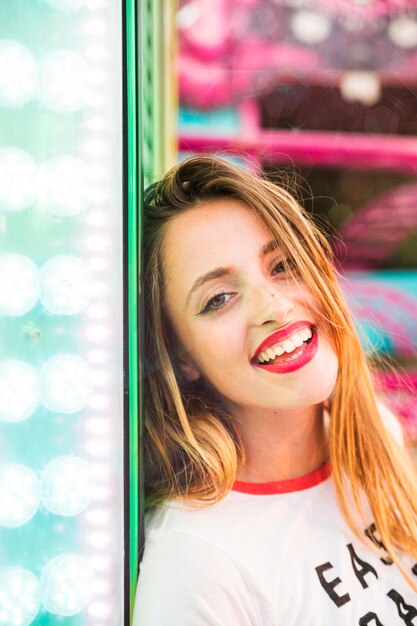 Portrait of a smiling young woman looking at camera