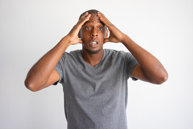 Portrait of stressed and desperate African American man