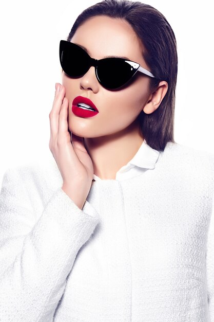 Portrait of stylish beautiful young woman with sunglasses