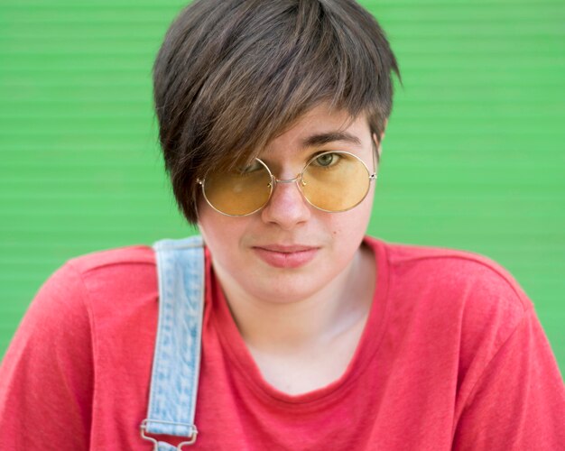 Portrait of stylish young boy wearing sunglasses