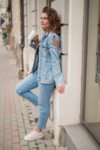 Portrait of stylish young girl posing