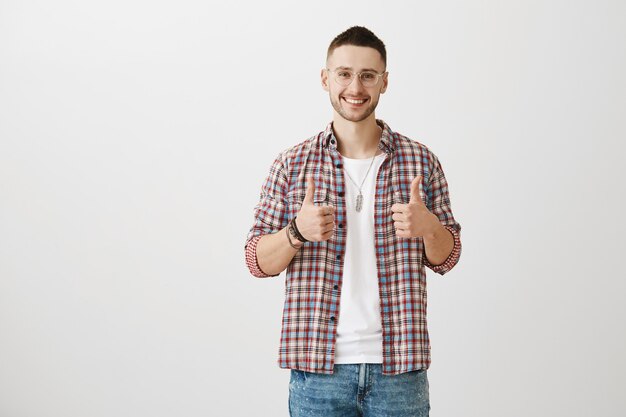 Portrait of stylish young guy posing