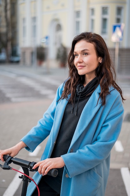 Portrait of stylish young woman looking away