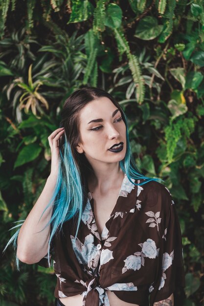 portrait of stylish young woman with gothic style makeup