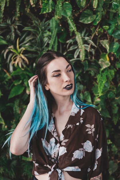 Portrait of stylish young woman with gothic style makeup