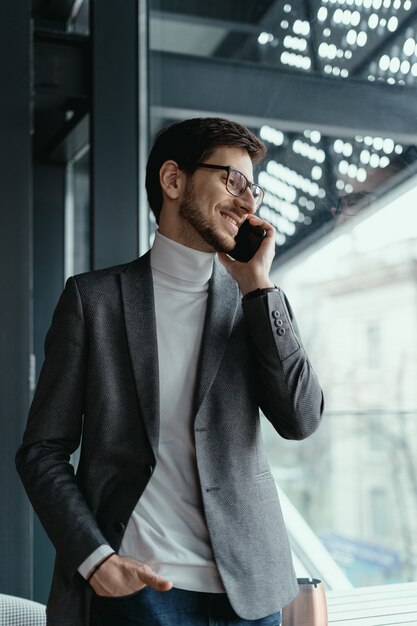 Portrait successful business man talking on the smartphone