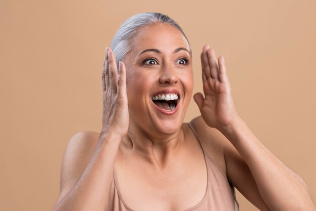 Portrait of surprised older woman