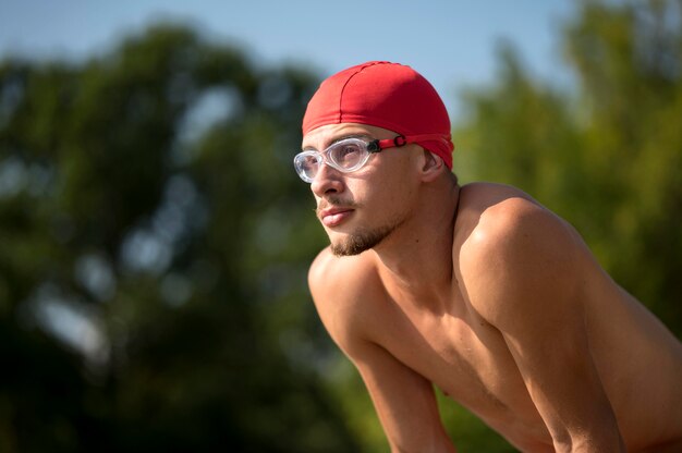 Free photo portrait of swimmer in nature