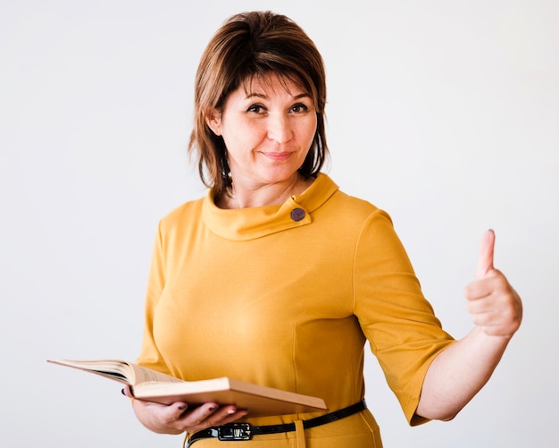 Free photo portrait teacher showing ok sign