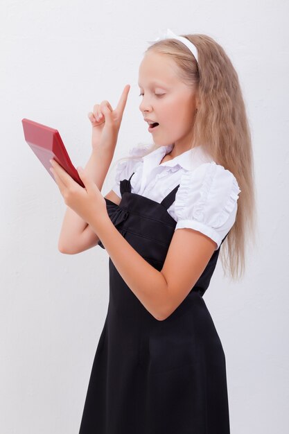 Portrait of teen girl with calculator