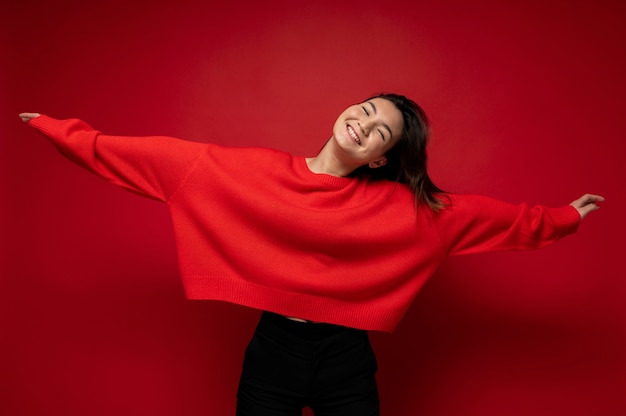 Portrait of a teenage girl dancing and smiling