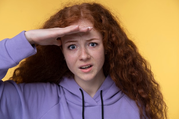 Portrait of teenage girl looking at something