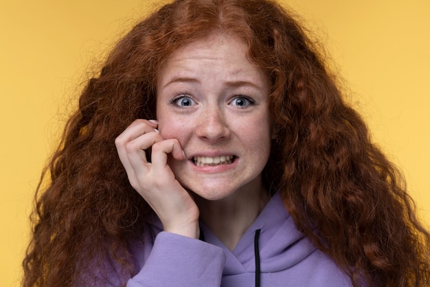 Portrait of teenage girl looking worried