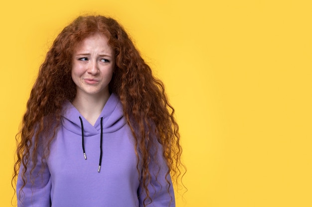 Portrait of teenage girl smirking