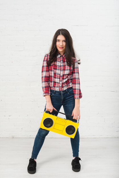 Portrait of teenage girl with music concept