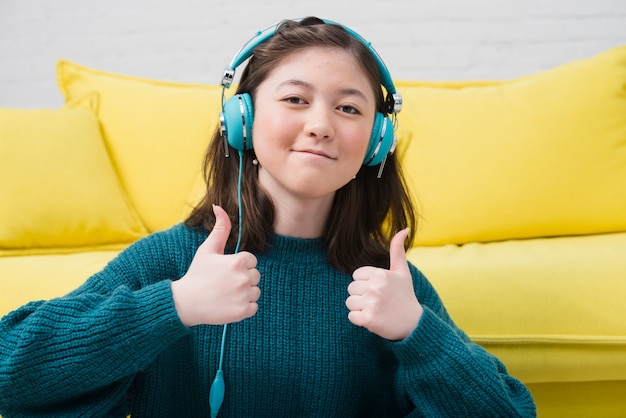Portrait of teenage girl with music concept