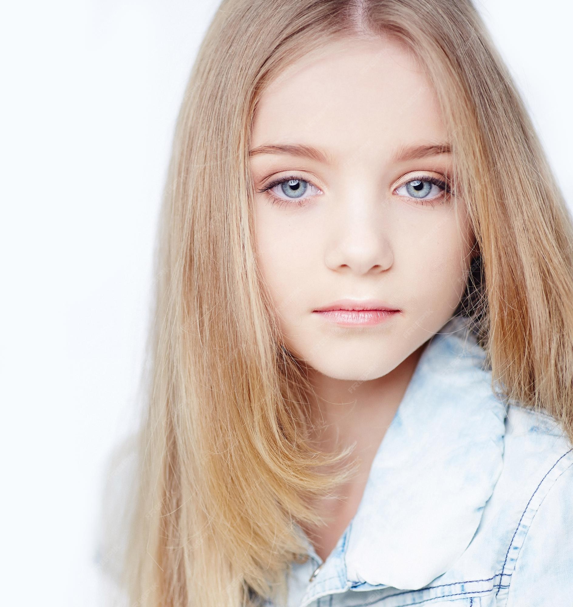 Free Photo | Portrait of teenager girl with long blond hair and blue eyes.