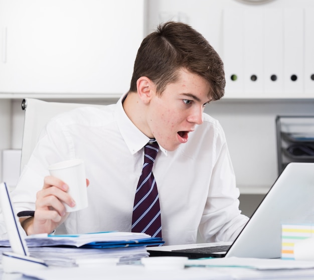 Portrait of teenager have problems at work